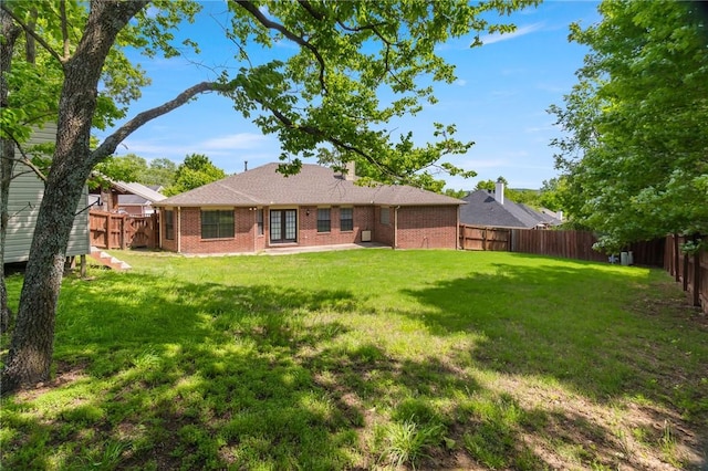 5530 Blake Ln, Springdale, AR 72762 - rear view of property with brick siding