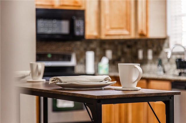 room details with a sink and black microwave