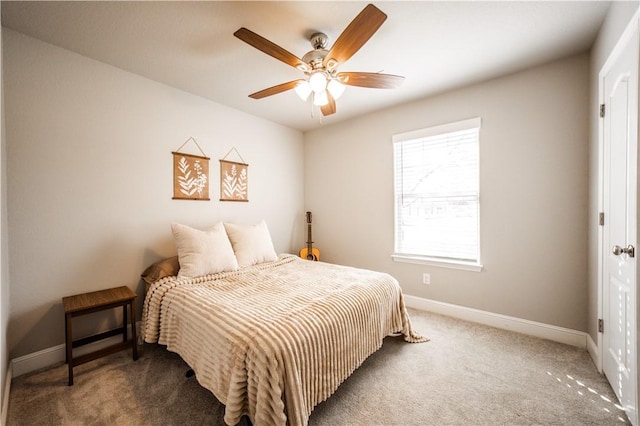 bedroom featuring carpet flooring, ceiling fan, and baseboards