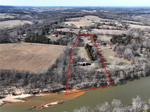 aerial view with a rural view and a water view