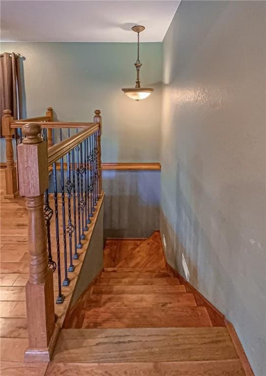 725 County Road 455, Berryville, AR 72616 - staircase with wood finished floors
