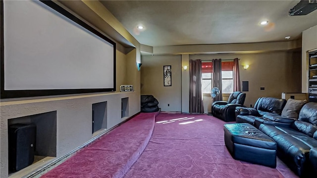 home theater featuring recessed lighting, a fireplace, and carpet flooring