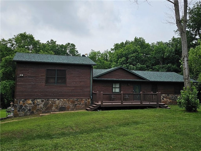 725 County Road 455, Berryville, AR 72616 - back of house with a deck, a yard, stone siding, and faux log siding