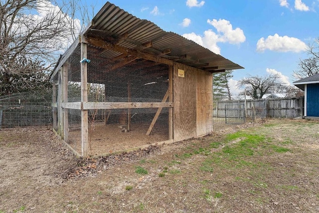 view of poultry coop with fence