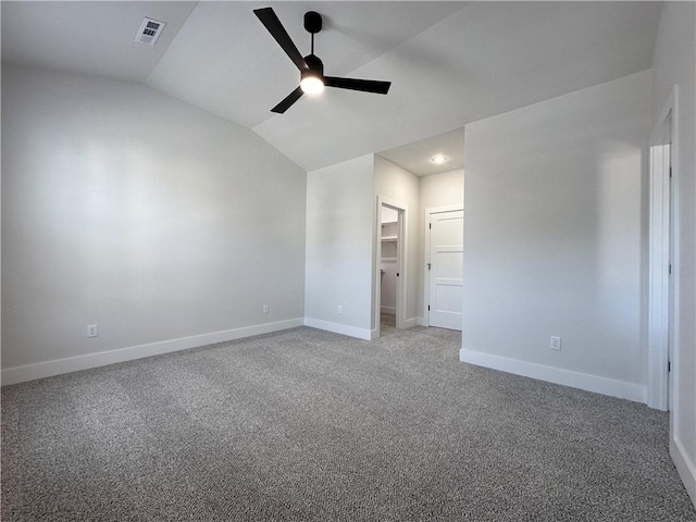 4412 W Bronco Dr, Fayetteville, AR 72704 - unfurnished bedroom with vaulted ceiling, light carpet, a spacious closet, ceiling fan, and recessed lighting