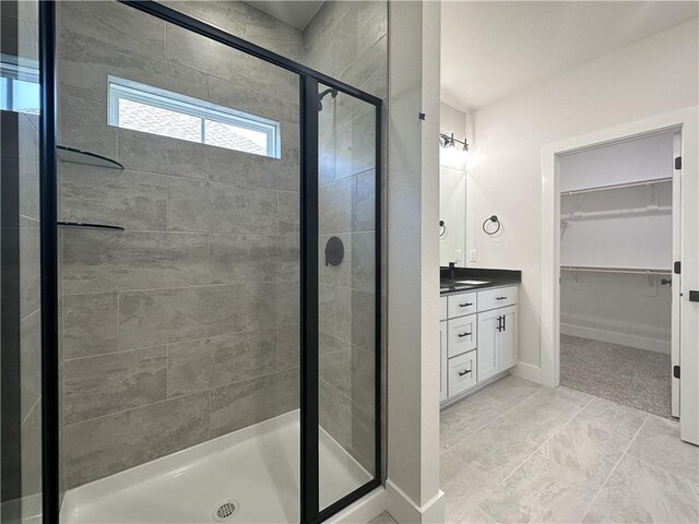 4412 W Bronco Dr, Fayetteville, AR 72704 - full bathroom featuring a spacious closet, a stall shower, and vanity