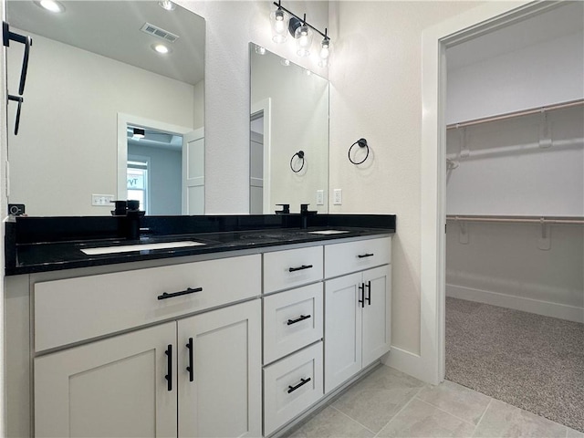 4412 W Bronco Dr, Fayetteville, AR 72704 - full bath with double vanity, a spacious closet, and recessed lighting