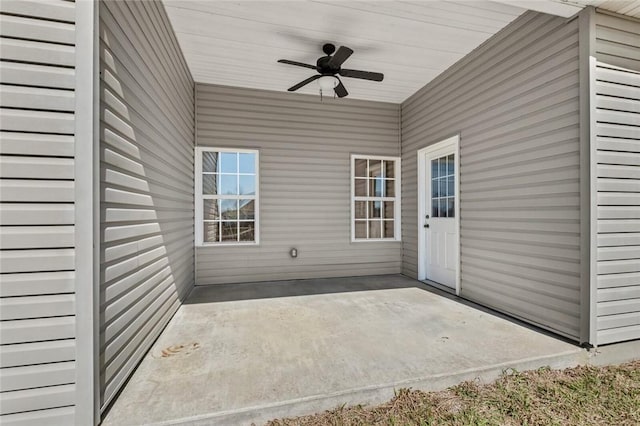 view of patio featuring a ceiling fan