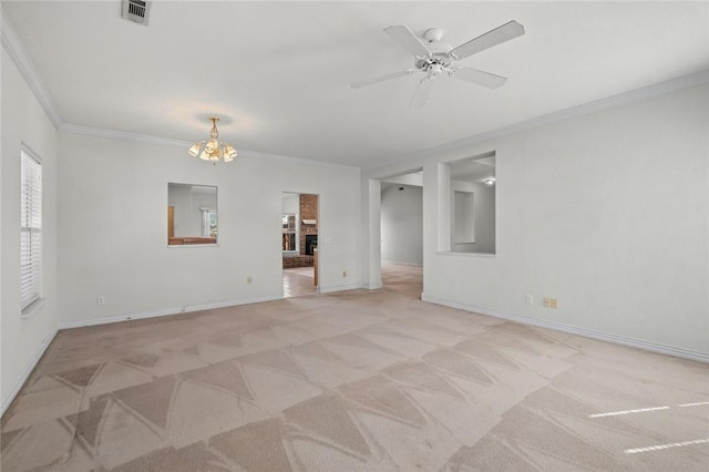 unfurnished room with light colored carpet, visible vents, and ornamental molding