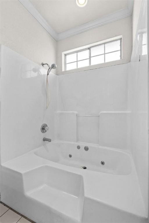 full bathroom featuring a wealth of natural light, tile patterned flooring, and ornamental molding