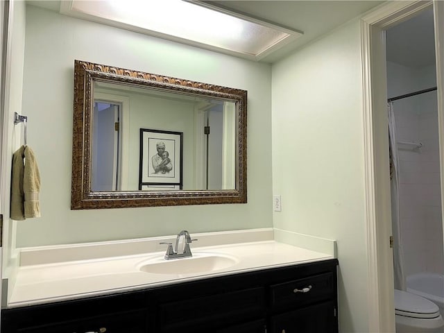 bathroom with toilet, vanity, and shower / tub combo with curtain