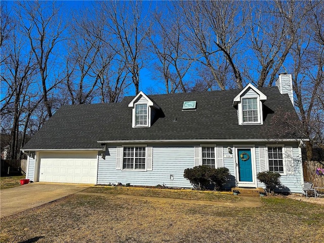 cape cod house featuring a front yard, roof with shingles, an attached garage, a chimney, and concrete driveway