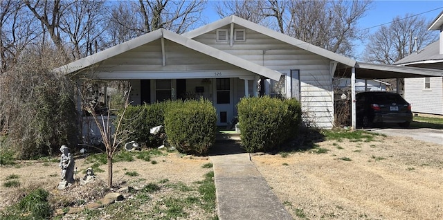 bungalow-style home featuring an attached carport