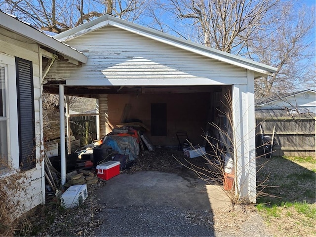 garage featuring fence