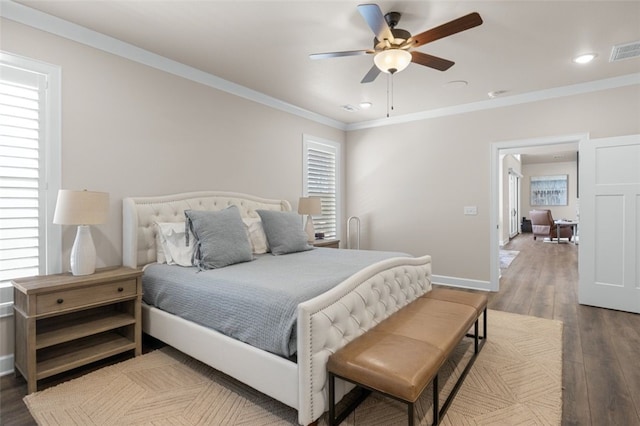 bedroom with baseboards, visible vents, recessed lighting, ornamental molding, and hardwood / wood-style flooring