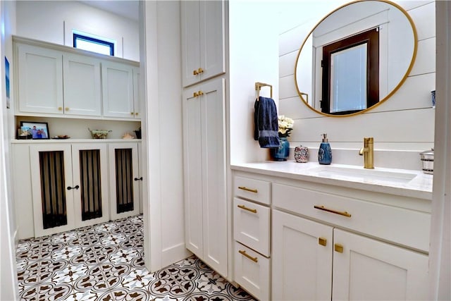 bathroom featuring tile patterned floors and vanity