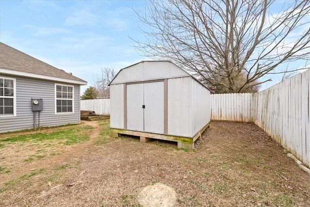 view of shed featuring a fenced backyard