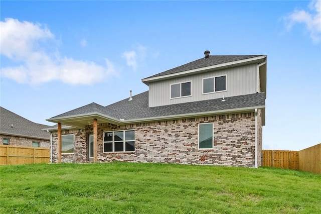 1804 Charles St, Pea Ridge, AR 72751 - rear view of property with a fenced backyard, brick siding, and roof with shingles