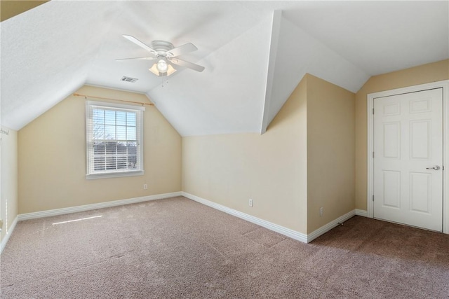 5102 Grove Dr, Rogers, AR 72758 - additional living space featuring vaulted ceiling, baseboards, a ceiling fan, and carpet flooring