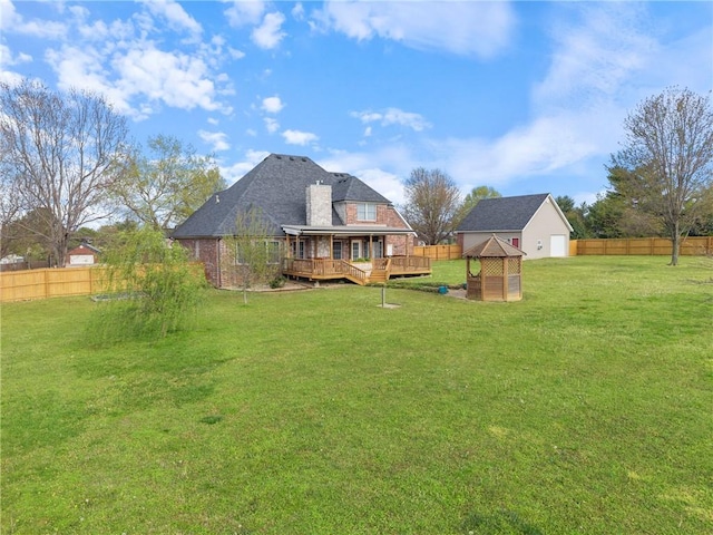 5102 Grove Dr, Rogers, AR 72758 - view of yard with a fenced backyard and a wooden deck