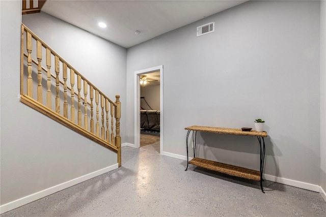 foyer entrance featuring recessed lighting, stairway, visible vents, and baseboards