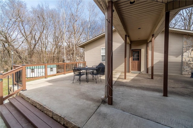 view of patio featuring outdoor dining area