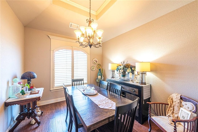 dining area with visible vents, a notable chandelier, crown molding, baseboards, and dark wood-style flooring