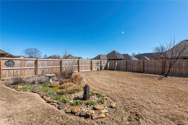 view of yard featuring a fenced backyard