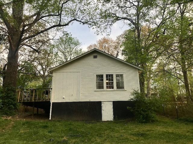 707 W S Ave, Harrison, AR 72601 - view of property exterior featuring a wooden deck and a yard