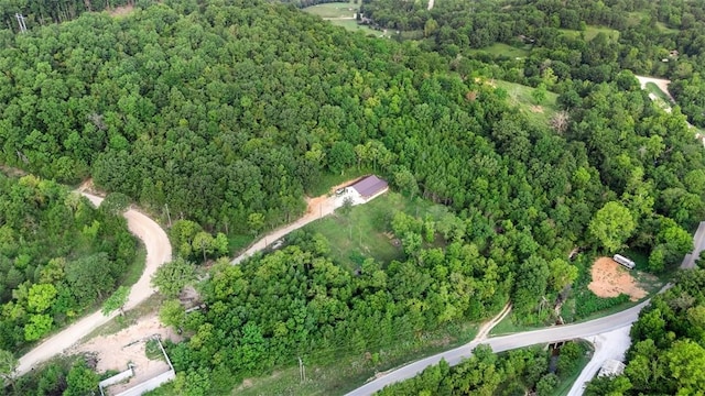 bird's eye view featuring a view of trees