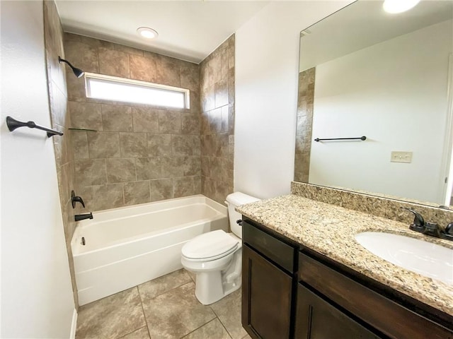 full bathroom with tile patterned floors, toilet,  shower combination, and vanity