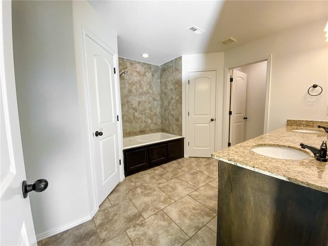 full bathroom featuring double vanity, visible vents, tub / shower combination, and a sink