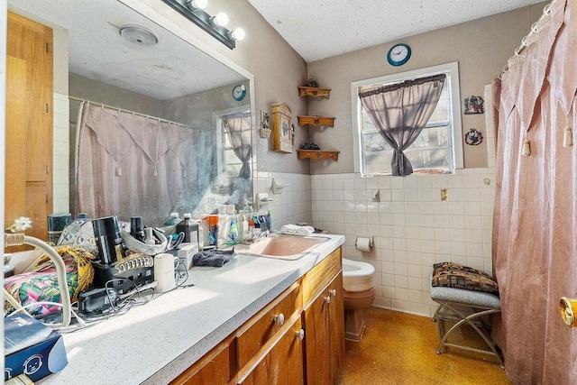 full bathroom featuring a wainscoted wall, toilet, a shower with shower curtain, tile walls, and vanity