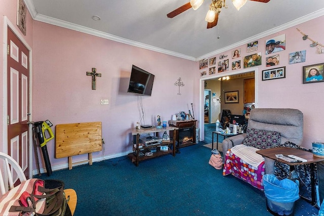 playroom featuring baseboards, a ceiling fan, carpet, and ornamental molding