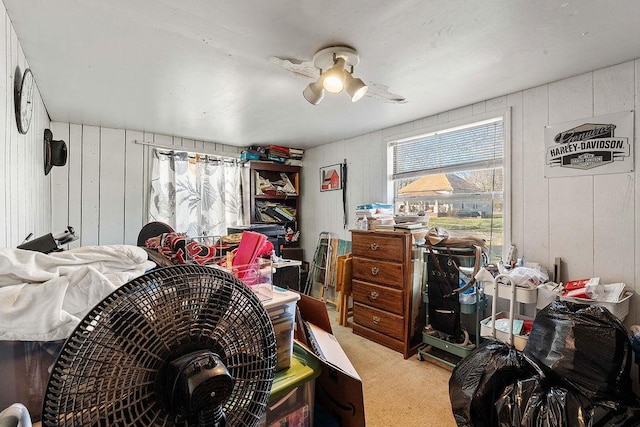 bedroom featuring a ceiling fan and light carpet