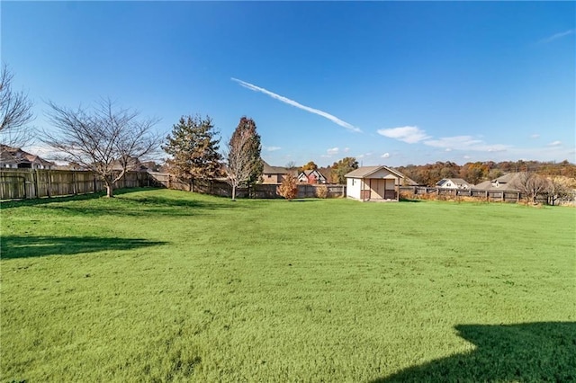 view of yard featuring a fenced backyard