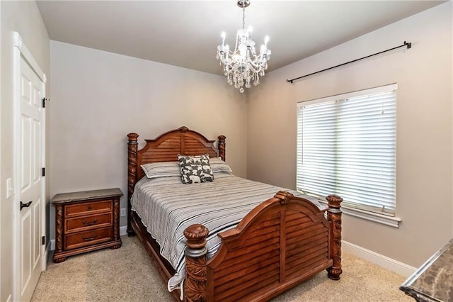 bedroom featuring an inviting chandelier, light colored carpet, and baseboards