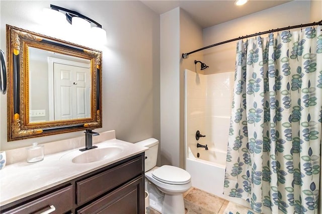 bathroom with vanity, tile patterned floors, toilet, and shower / bath combo