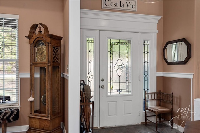 foyer entrance featuring plenty of natural light