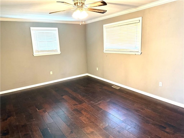 unfurnished room featuring hardwood / wood-style flooring, a ceiling fan, baseboards, and ornamental molding