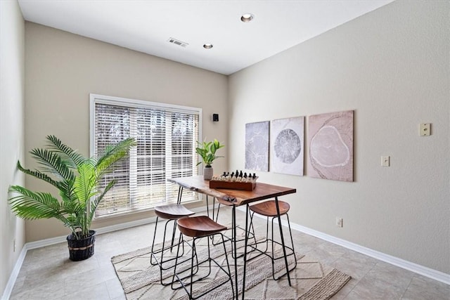 dining room featuring recessed lighting, light tile patterned floors, visible vents, and baseboards