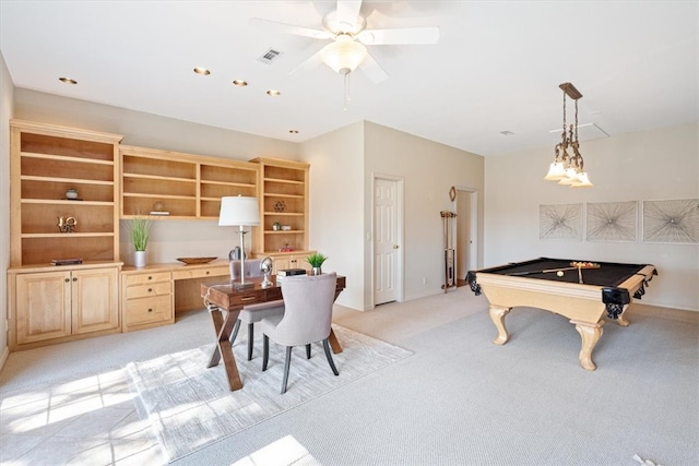 recreation room with billiards, visible vents, built in study area, ceiling fan, and light carpet