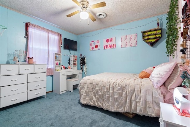 carpeted bedroom with ceiling fan, crown molding, visible vents, and a textured ceiling