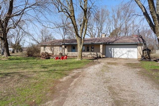 single story home featuring a garage, a front lawn, a chimney, and driveway