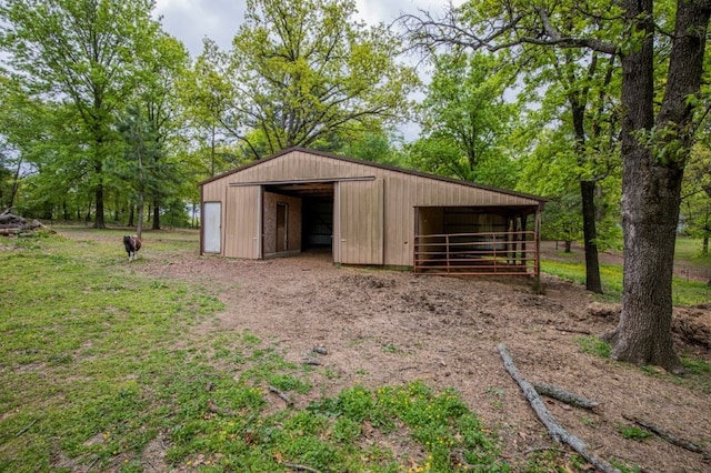 view of outbuilding featuring an outdoor structure and an exterior structure