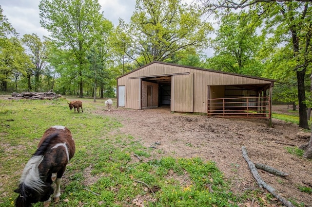 view of outdoor structure featuring an outbuilding and an exterior structure