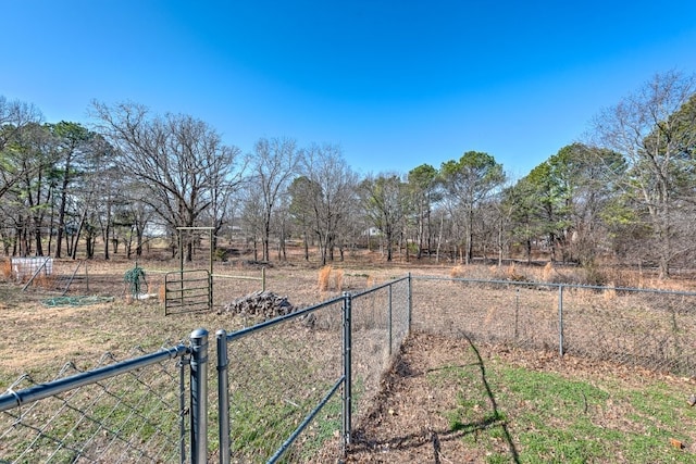 view of yard with a gate and fence