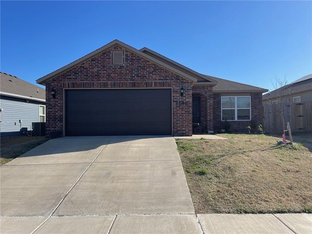 single story home with central air condition unit, driveway, fence, a garage, and brick siding