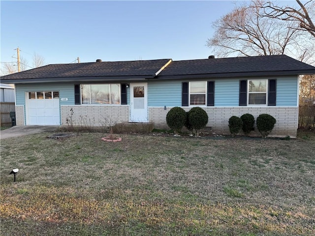 1108 W Olive St, Rogers, AR 72756 - ranch-style house with brick siding, an attached garage, and a front lawn
