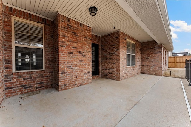 view of patio with fence